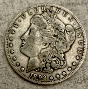 Old Man Duffy’s 1892 s hot date! Morgan Silver $ about VF hard to get! Gr8 Deal