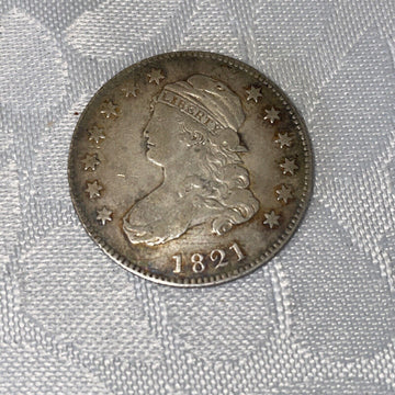 Old Man Duffy’s 1821 Capped Liberty Quarter. 200 year old extra fine beauty.