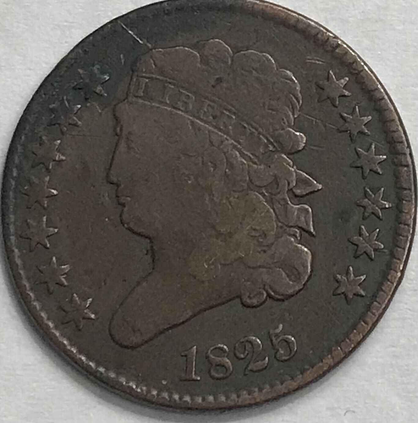 1825 classic head half cent fine circulated coin flanked by stars value￼