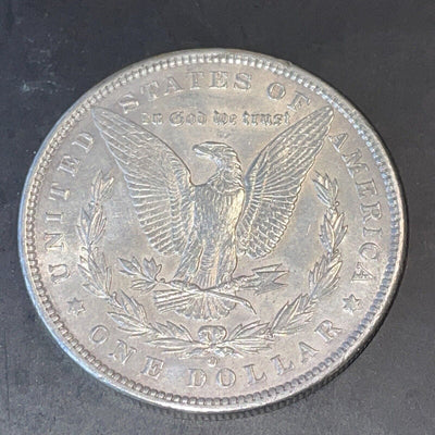 Scarce 1897 o Uncirculated Det $ tiny scratches & dings real winner, collectible