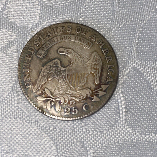 Old Man Duffy’s 1821 Capped Liberty Quarter. 200 year old extra fine beauty.