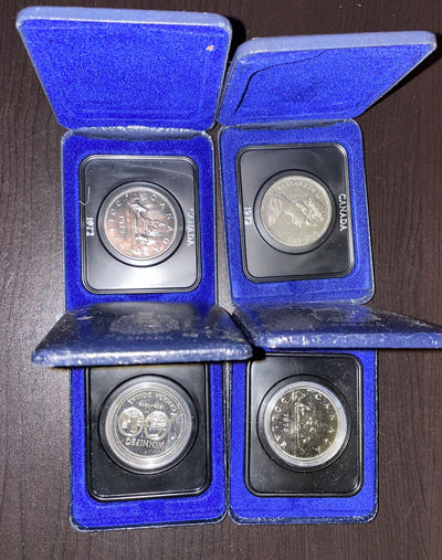 Lot of 4 different silvercolor nickel loonies proof in box OGP 1 bid per lot