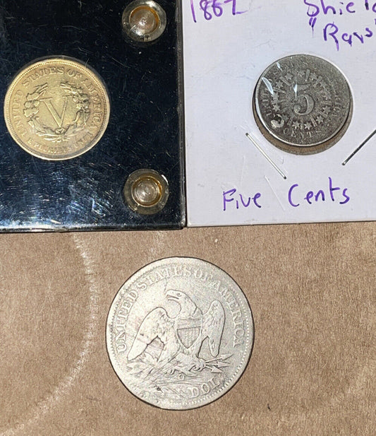 Duffy’s Curious lot: 1883 not gold 5c, 1867 rays 5c holey, 1855 o half$ dmg