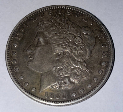 1884 s choice extra fine Morgan Silver Dollar Tough date in high grades BIN